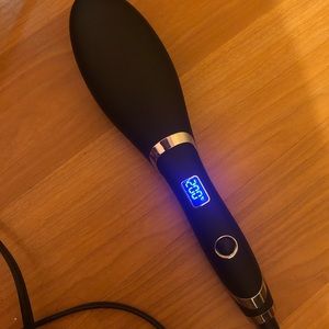 Ionic hair straightener